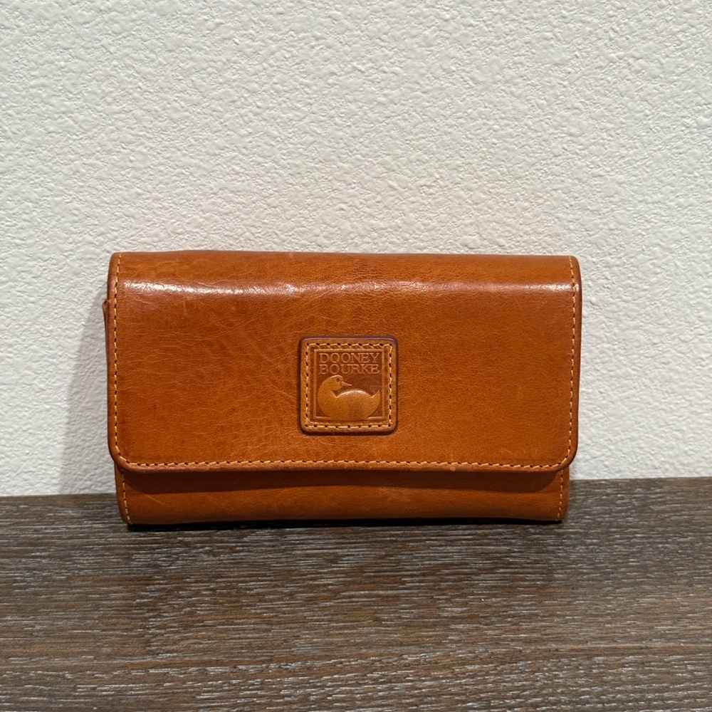 Dooney & Bourke Florentine Flap Wallet in Natural. EUC